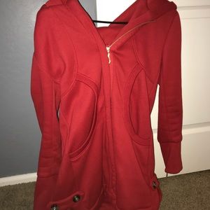 Red jacket with gold zipper